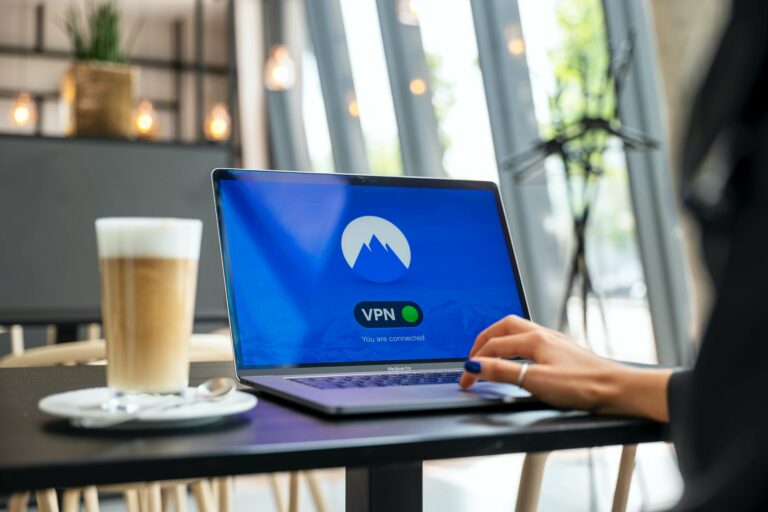 A woman using VPN on a laptop