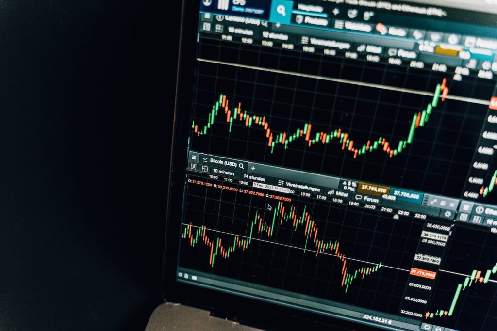 Stock charts on a laptop