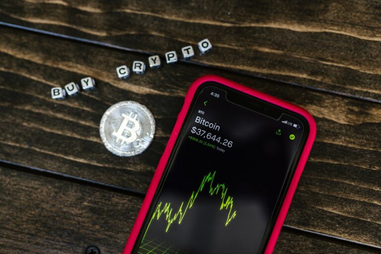 Bitcoin and Phone on the table