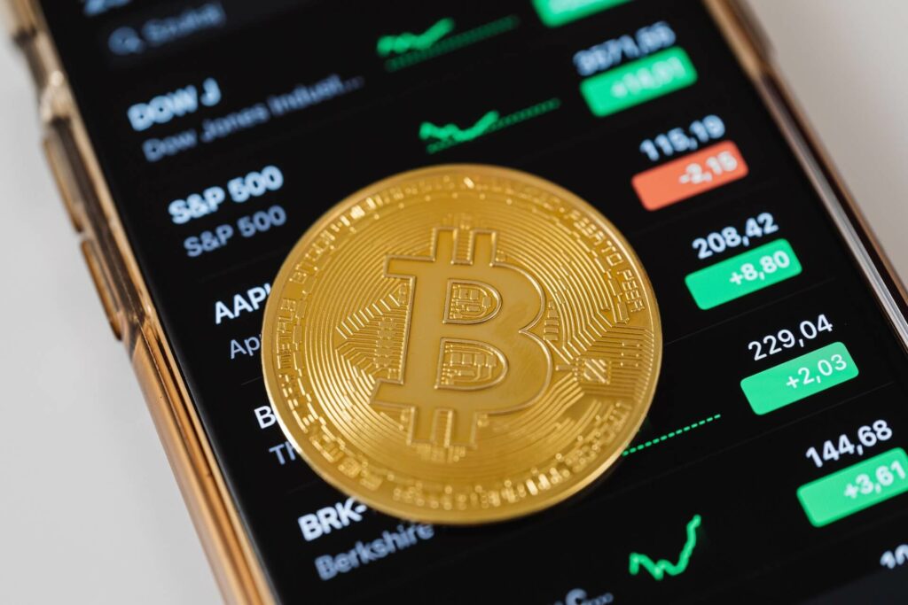 Gold bitcoin on a smartphone 