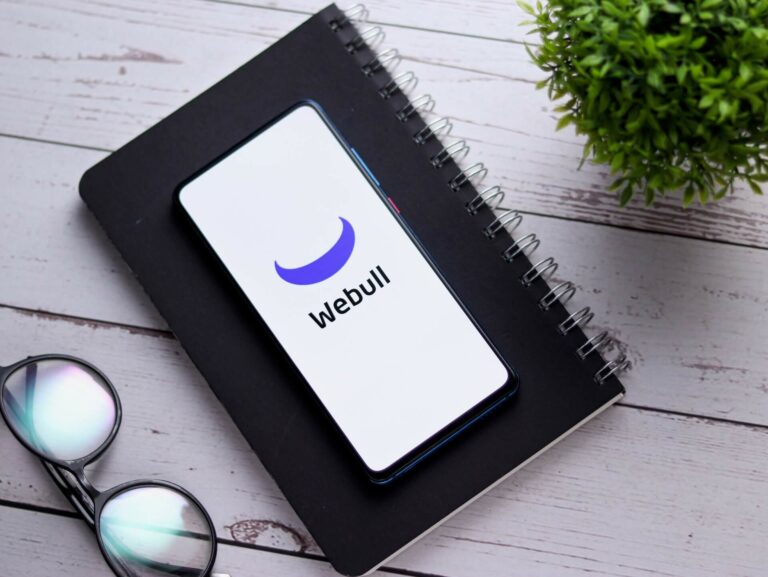 Webull app logo on a smartphone
